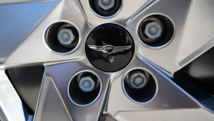 What is a wheel hub and how does it work in a car
